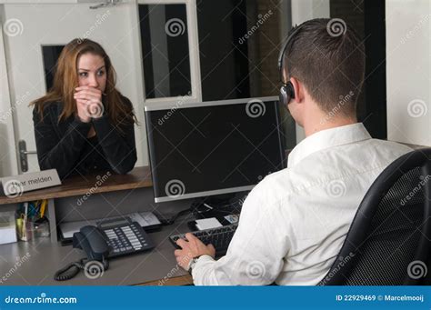 A Customer Arrives At A Customer Service Desk