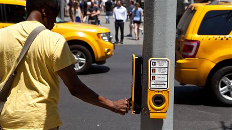 Blind Or Partially Blind Pedestrians Can Be Identified By ______.